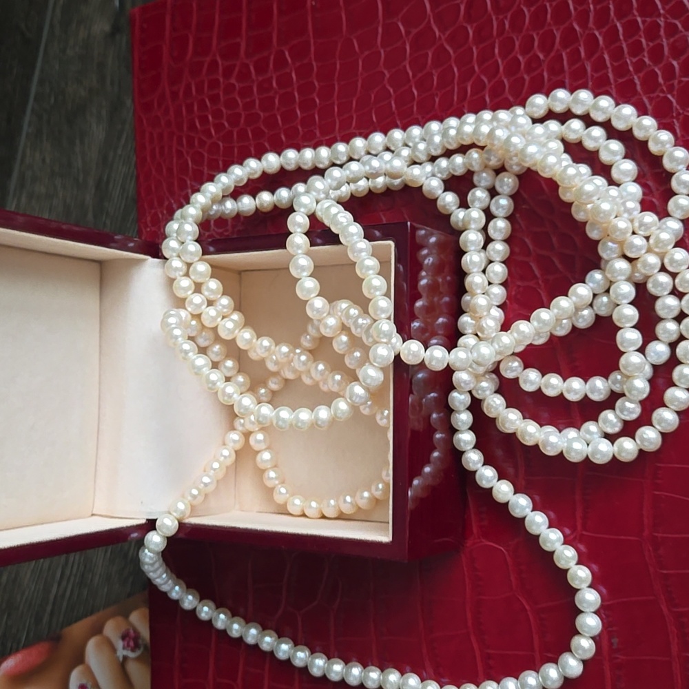 Long Strand Of Pearls
